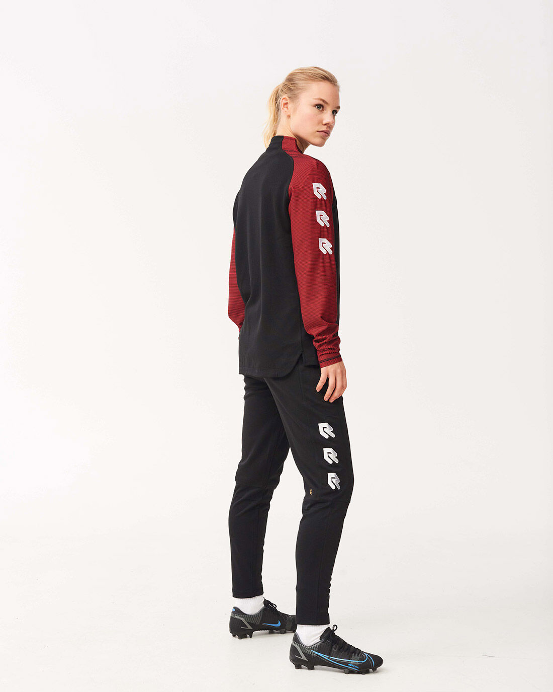 Nike tracksuit black and red sales